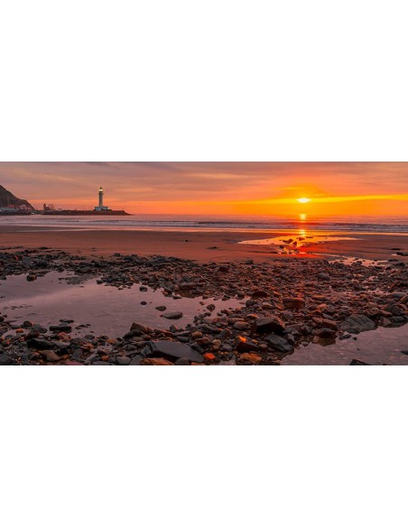 Puesta de sol en la costa de Yorkshire, Reino Unido