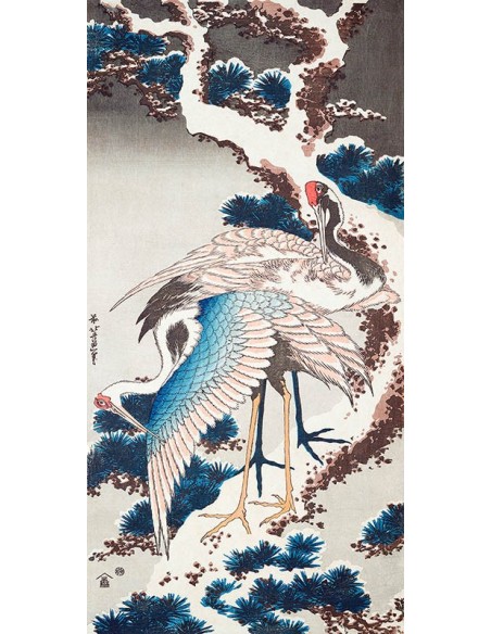 Grúas en un árbol nevado