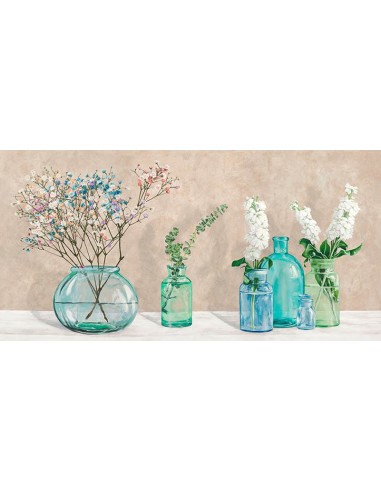 Decoración floral con jarrones de cristal