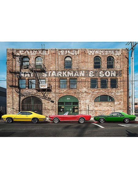 Paisaje urbano con muscle cars