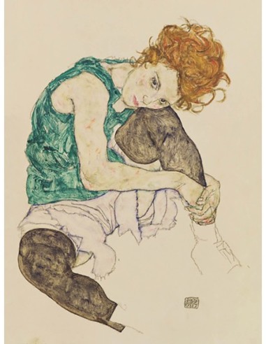 Mujer sentada con la rodilla doblada