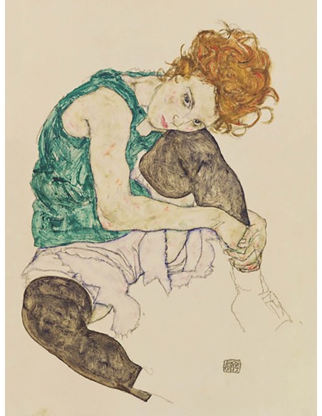 Mujer sentada con la rodilla doblada